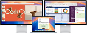 Un MacBook Air aperto, con due monitor esterni su cui sono mostrate diverse app